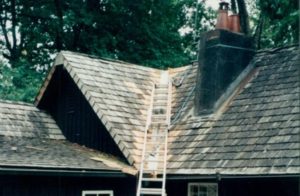 Valley iron replacement to a shingled roof at an Edna Walling cottage