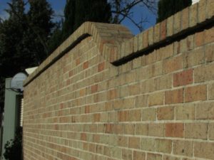 Boundary terrace fence rolling up towards rear for privacy