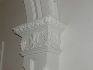 A latex mould was made of the original plaster detailing,and a template cut to the arch profile