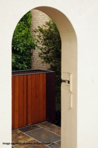 A clever architect designed balustrade, planter bed and storage unit viewed from street level.